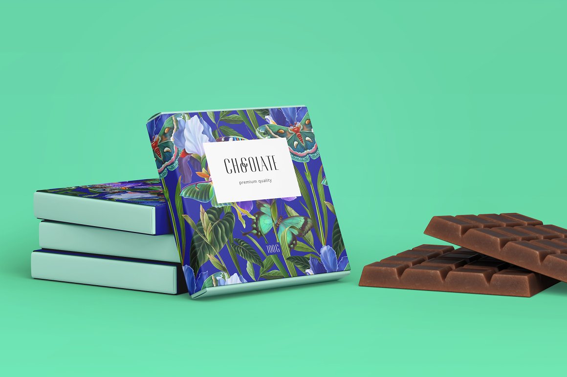 Chocolate bar packaging with floral patterns on a green background.
