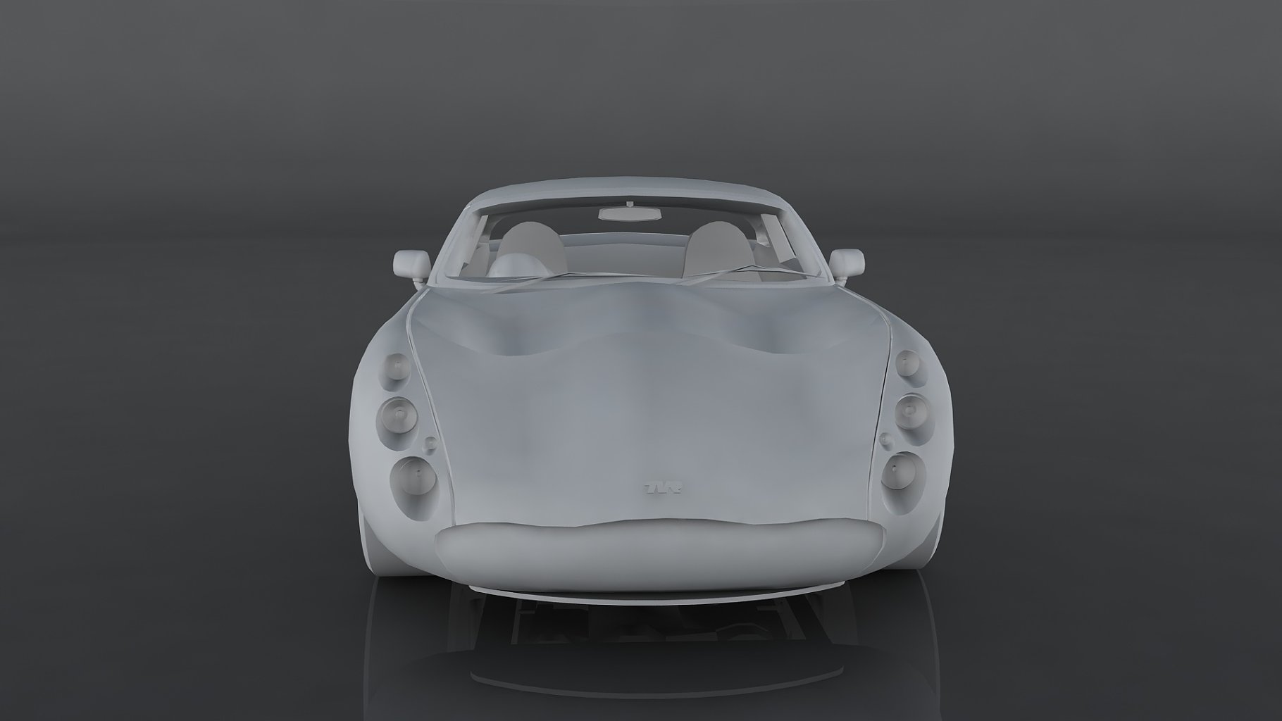 Gray front mockup of 2001 tvr tuscan s on a dark gray background.