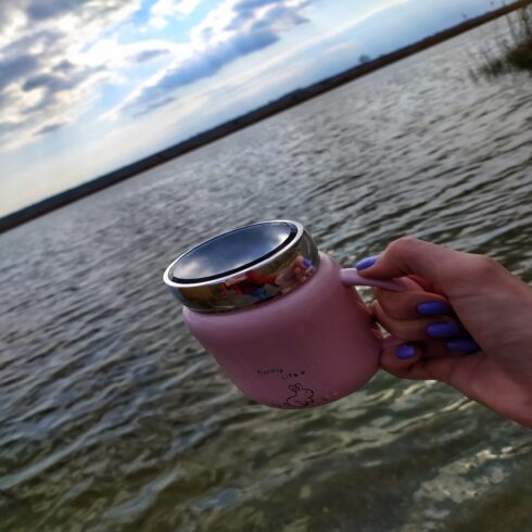 Herbal Tea in Cup near River cover image.