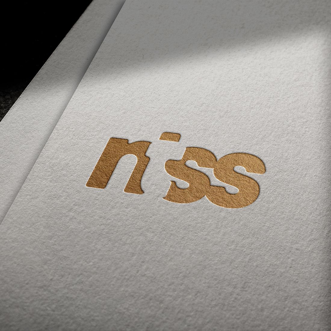 Lettering Ntss Logo Golden and White Mockup Design preview image.