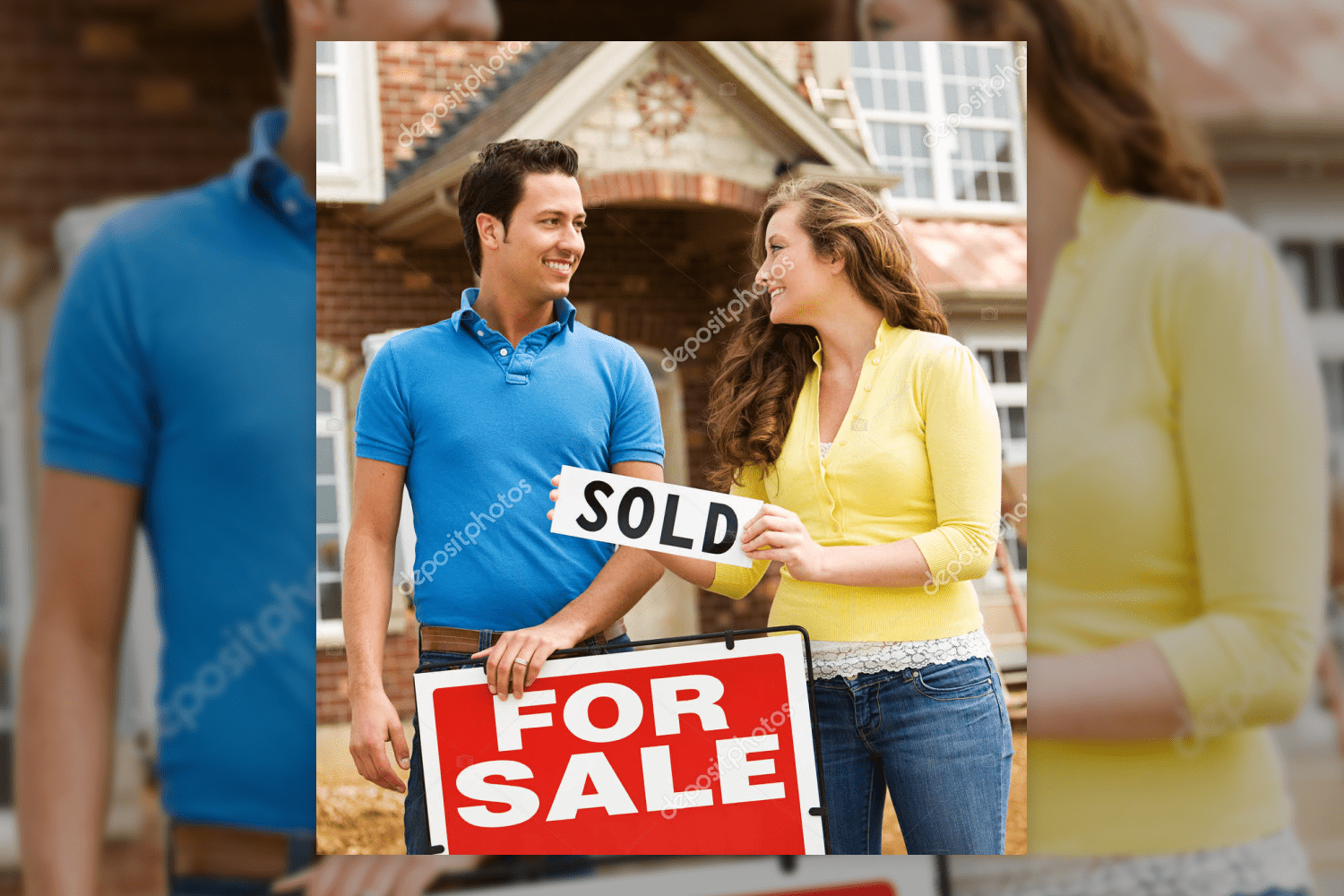 15. smiling and kissing couple in front of sold real estate sign 989