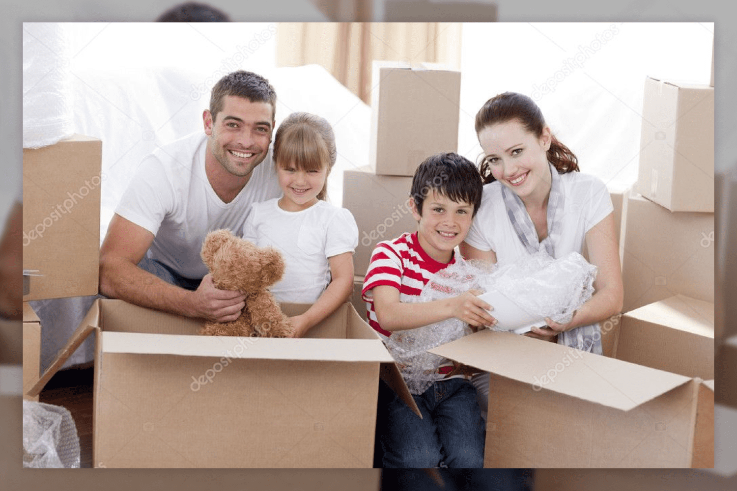 16 young family with kids moving home with boxes around 690