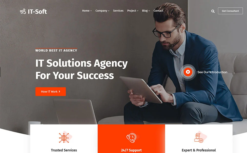 White lettering "IT Solutions Agency For Your Success" and banner with photo of man and white and orange icons and buttons.