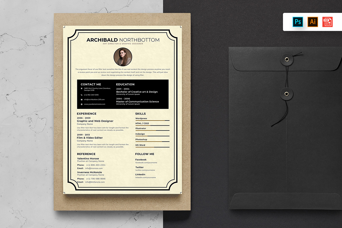 Black and white resume is next to a brown envelope.