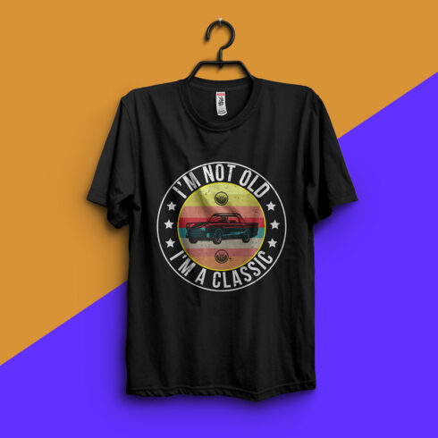 Image of a black t-shirt with an adorable retro car print