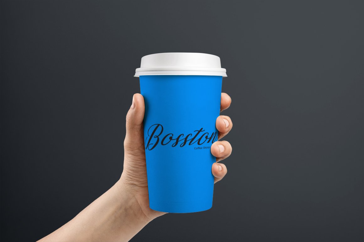 Blue cup with black lettering "Boston" and white lid.