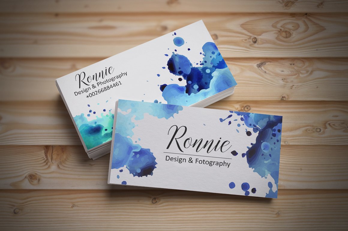 A lot of white visiting cards with black lettering "Ronnie" and blue watercolor illustrations.