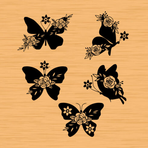 Set of four butterflies with flowers on them.