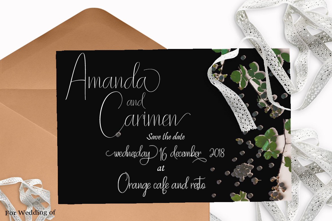 Black invitation card with white lettering "Amanda and Carimen".