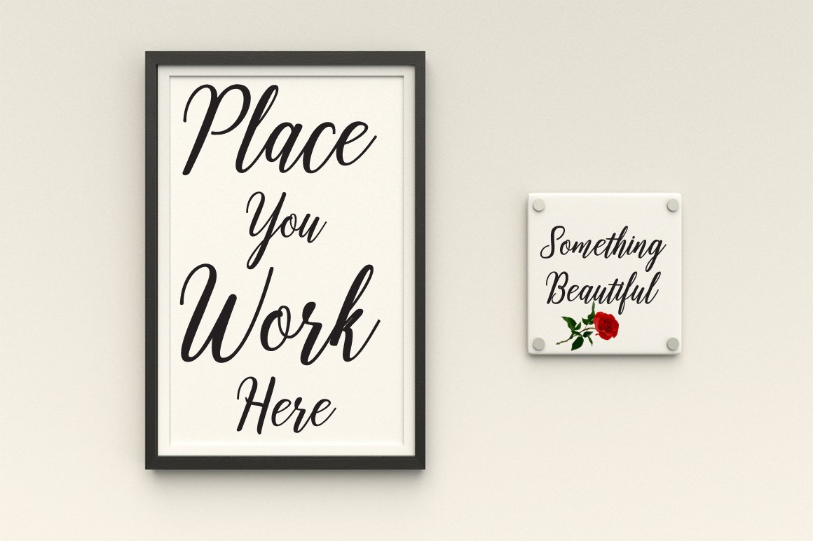 Black lettering on a white background in black frame and white card with black lettering.