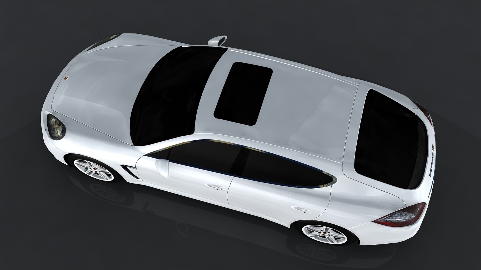 2010 porsche panamera turbo mockup on a dark gray background from above.