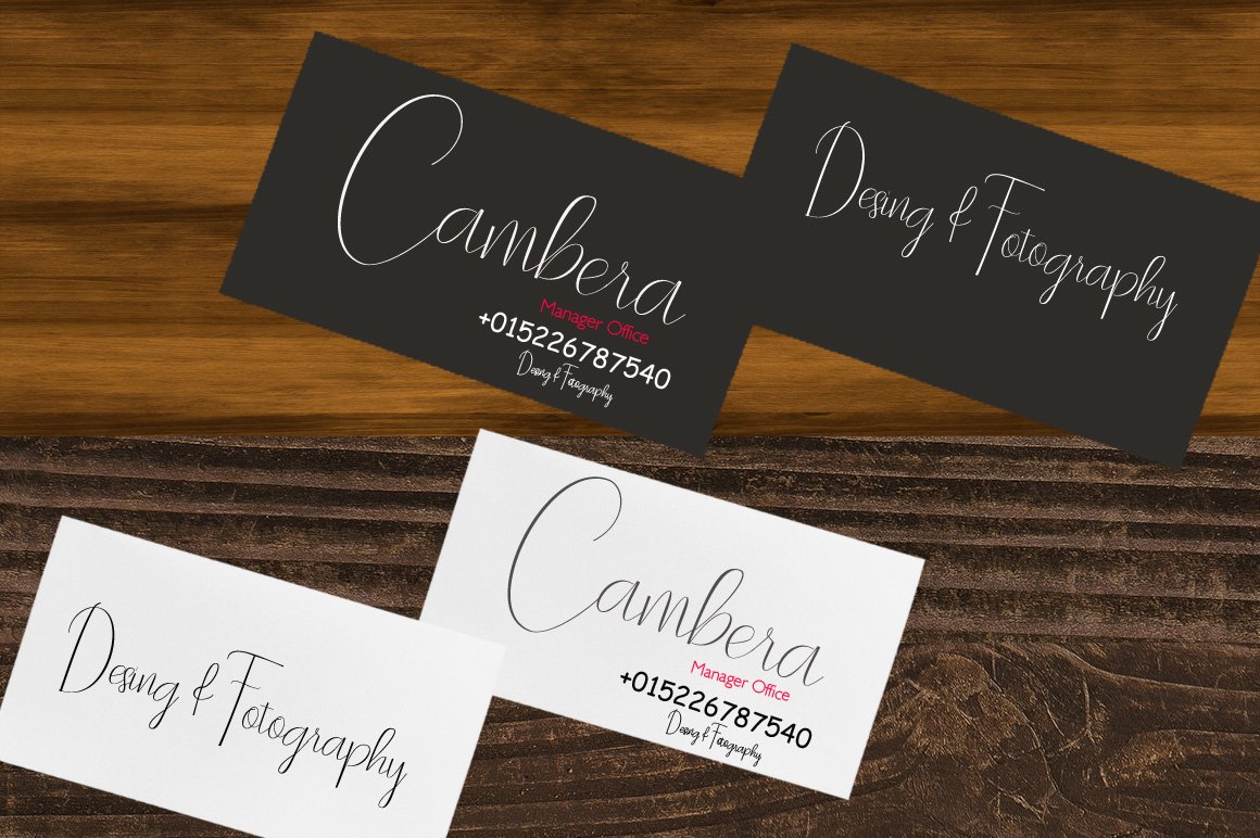 Dark gray and white visiting cards with white and dark gray lettering.
