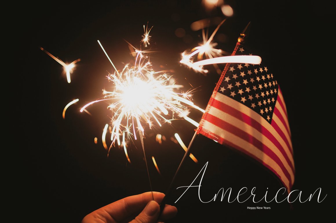 Picture of a flag of America and sparklers with white lettering "American".