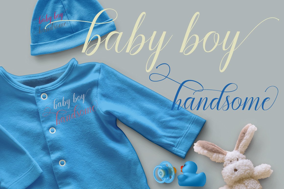 Beige and blue lettering "Baby boy handsome" and blue baby bodysuit and hat with the same lettering.