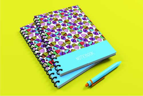 A picture of a notebook with a great design with images of sweets