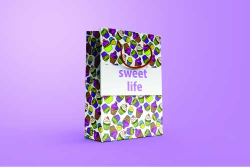 Picture of a paper bag with an adorable design featuring sweets