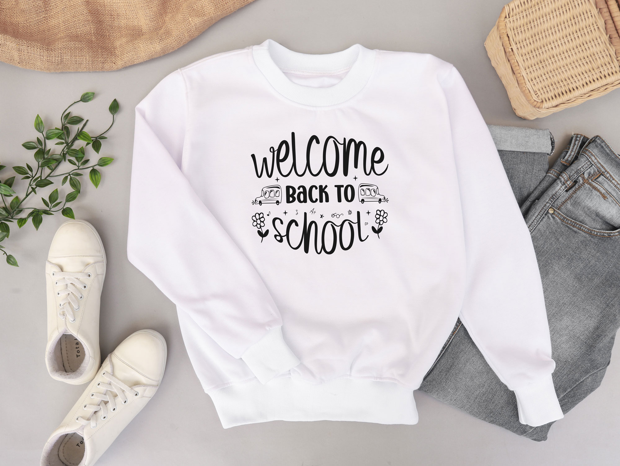 Image of a white sweatshirt with a wonderful inscription Welcome back to school