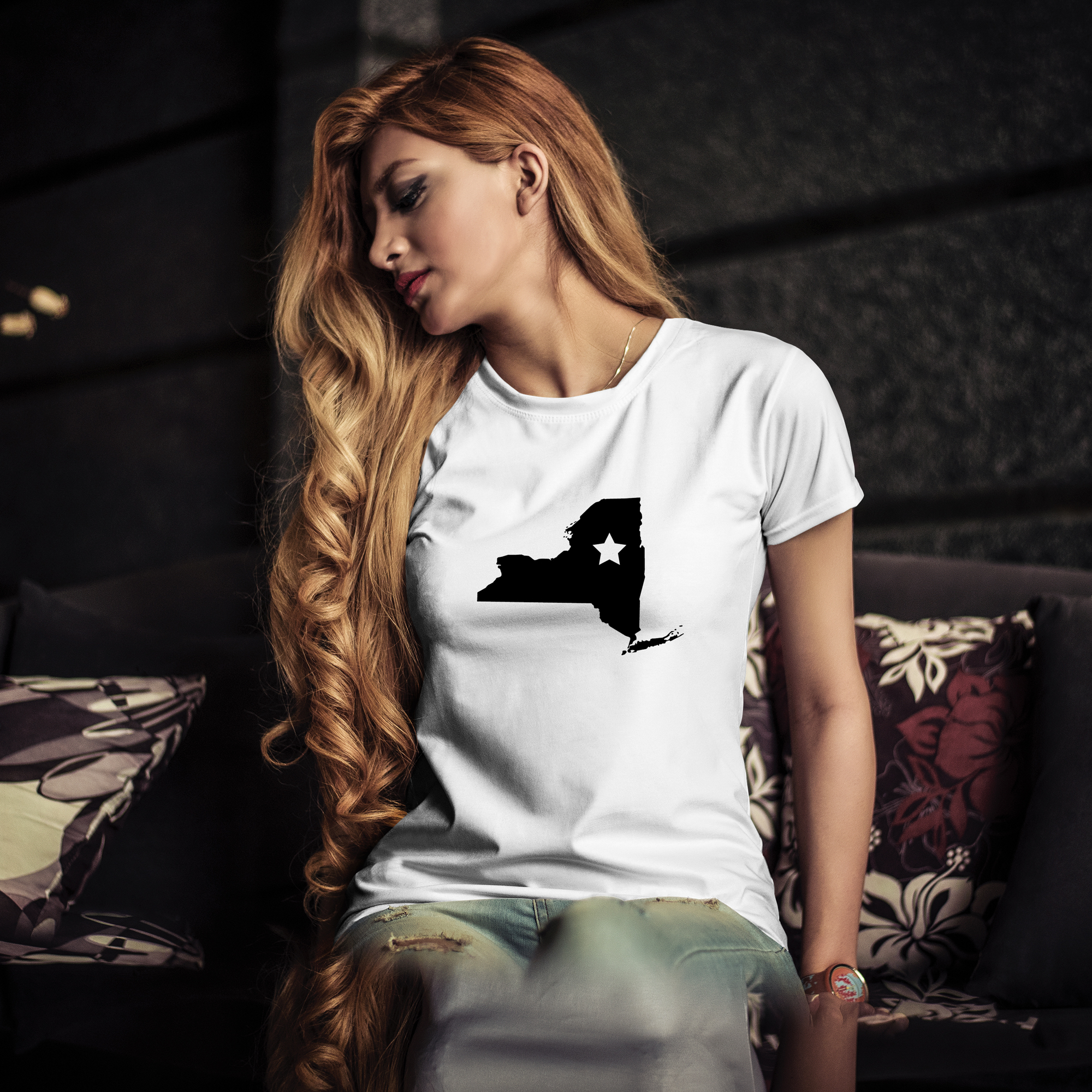 White t-shirt with black illustration of New York state.