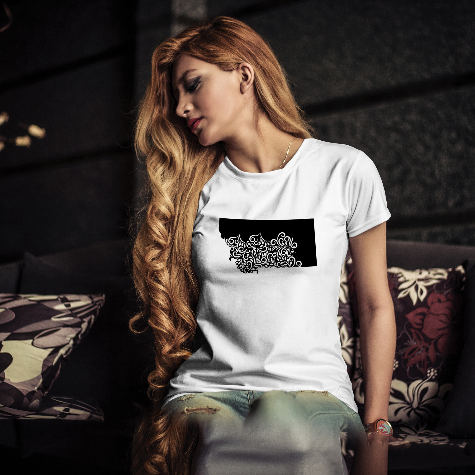 White t-shirt with black illustration of Montana state.