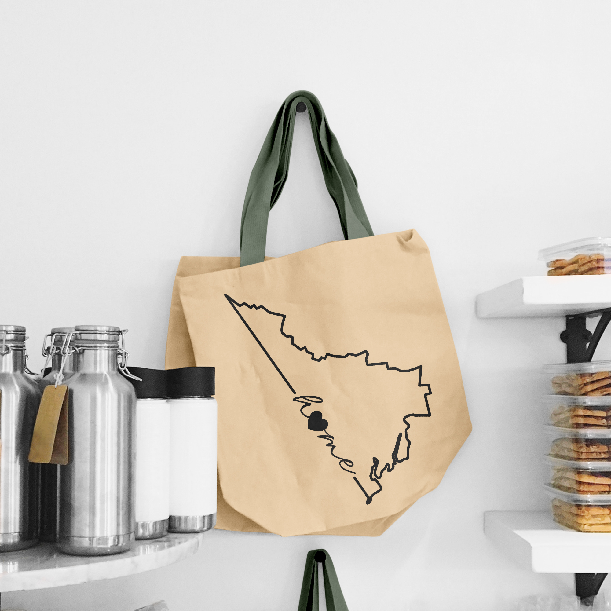 Black illustration of map of Virginia on the beige shopping bag with dirty green handle.