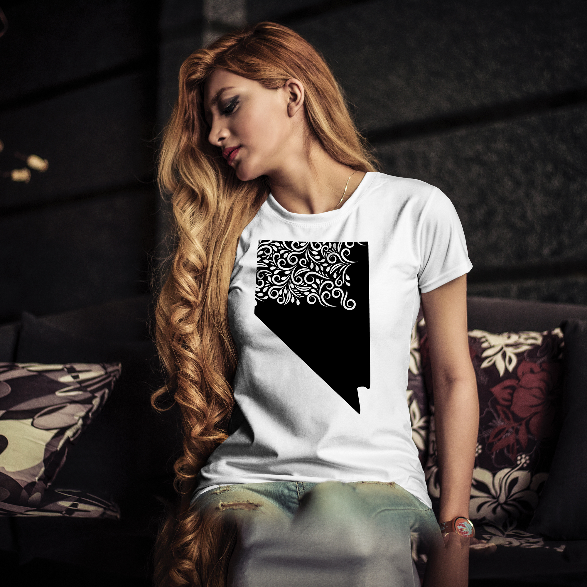 White t-shirt with black illustration of Nevada state.