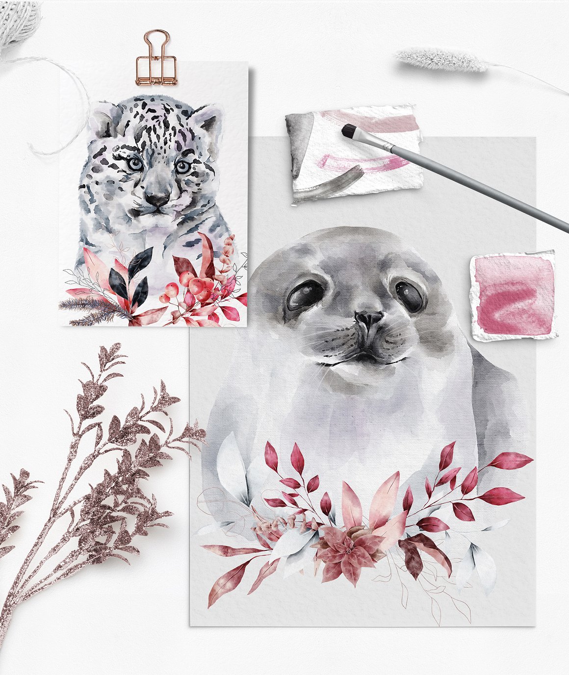 Watercolor drawings of leopard and seal on sheet.