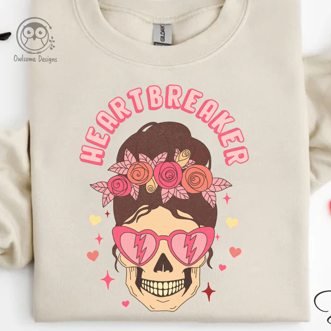 Image of t-shirt with amazing print female skull wearing pink glasses.