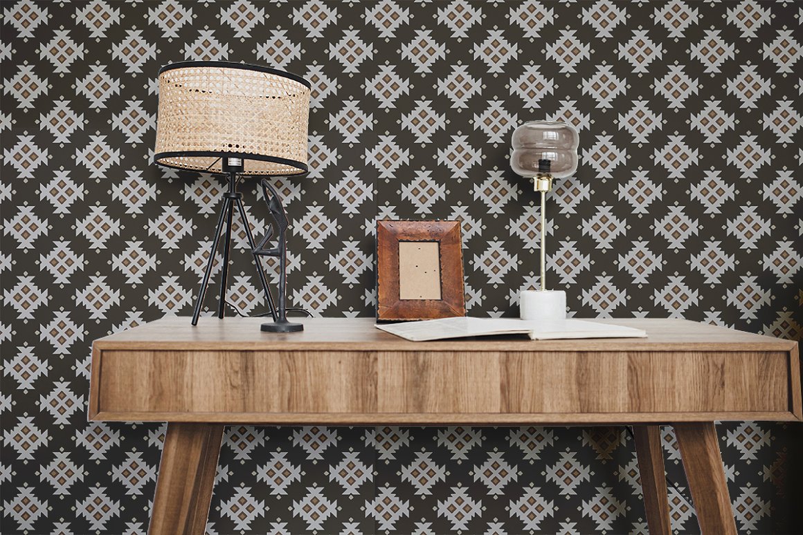Wooden table and wallpaper with earthy aztec pattern.