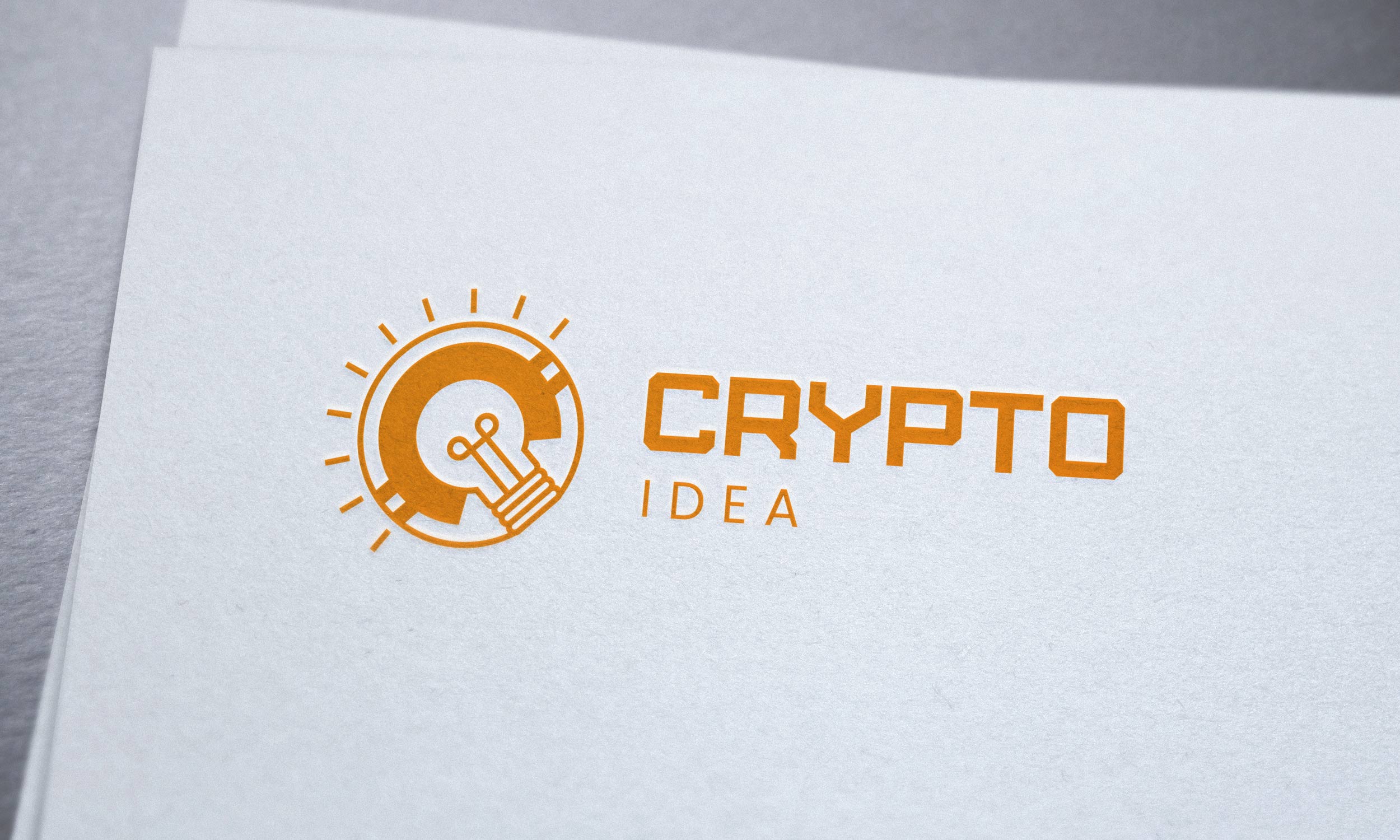 Gold crypto logo on a paper.