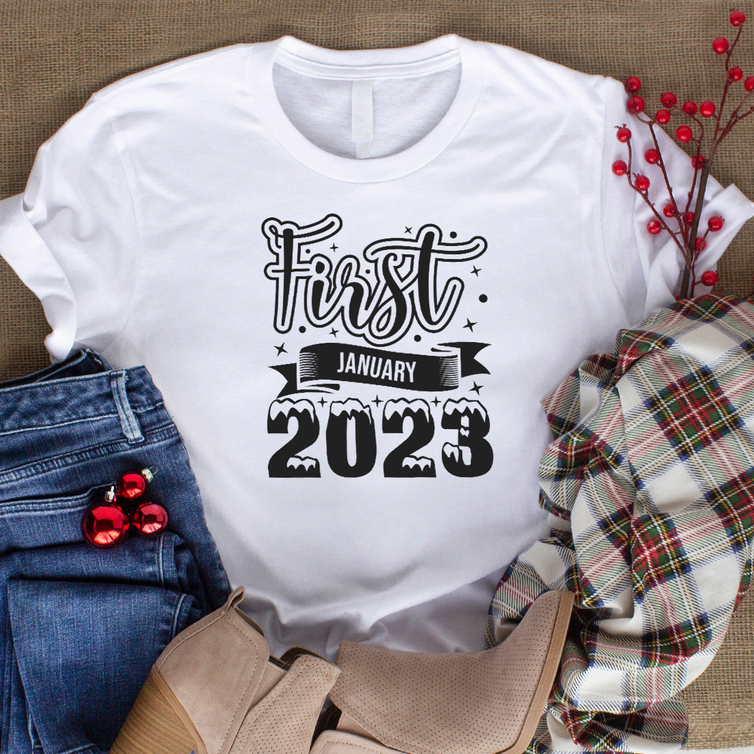 Image of a white t-shirt with a charming slogan First January 2023