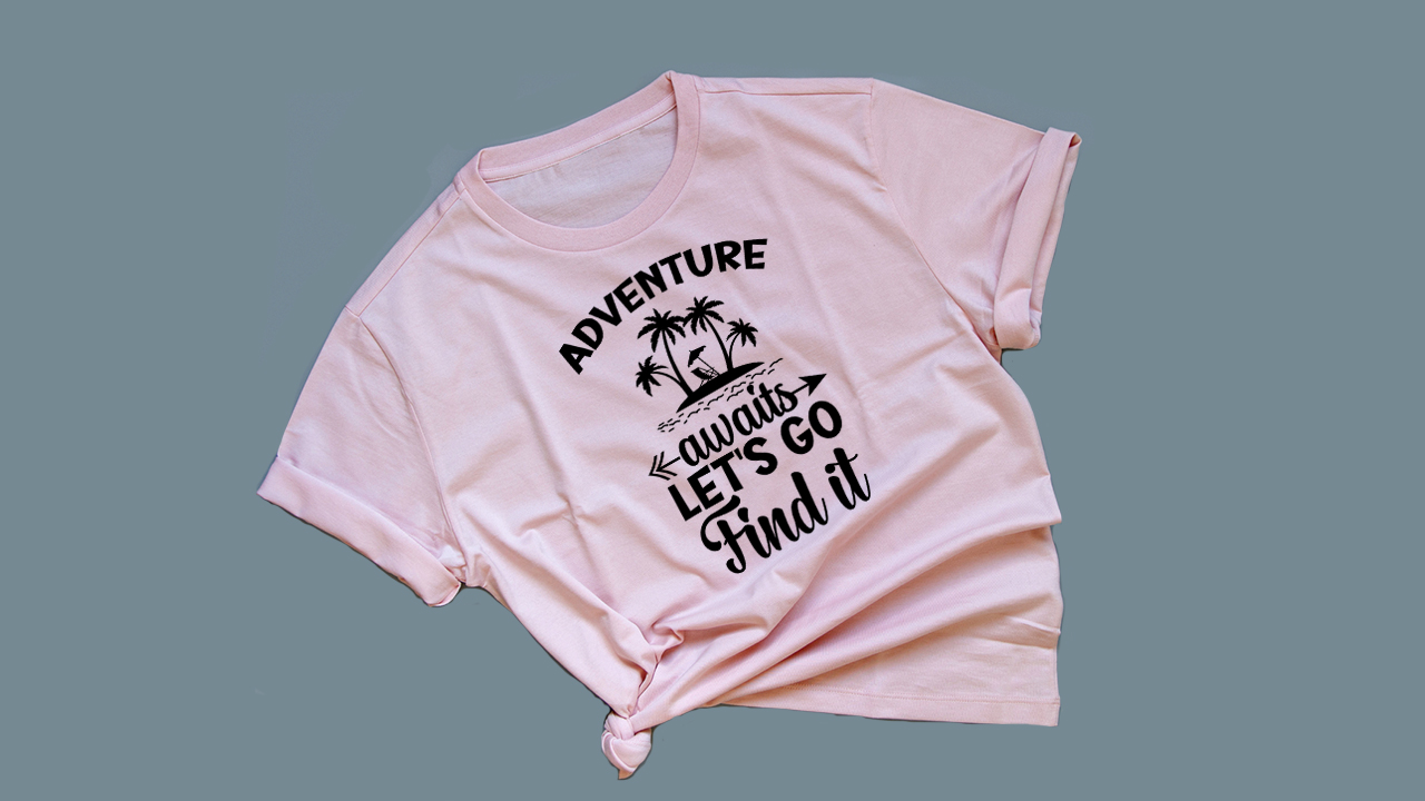 Pink t-shirt with black lettering.