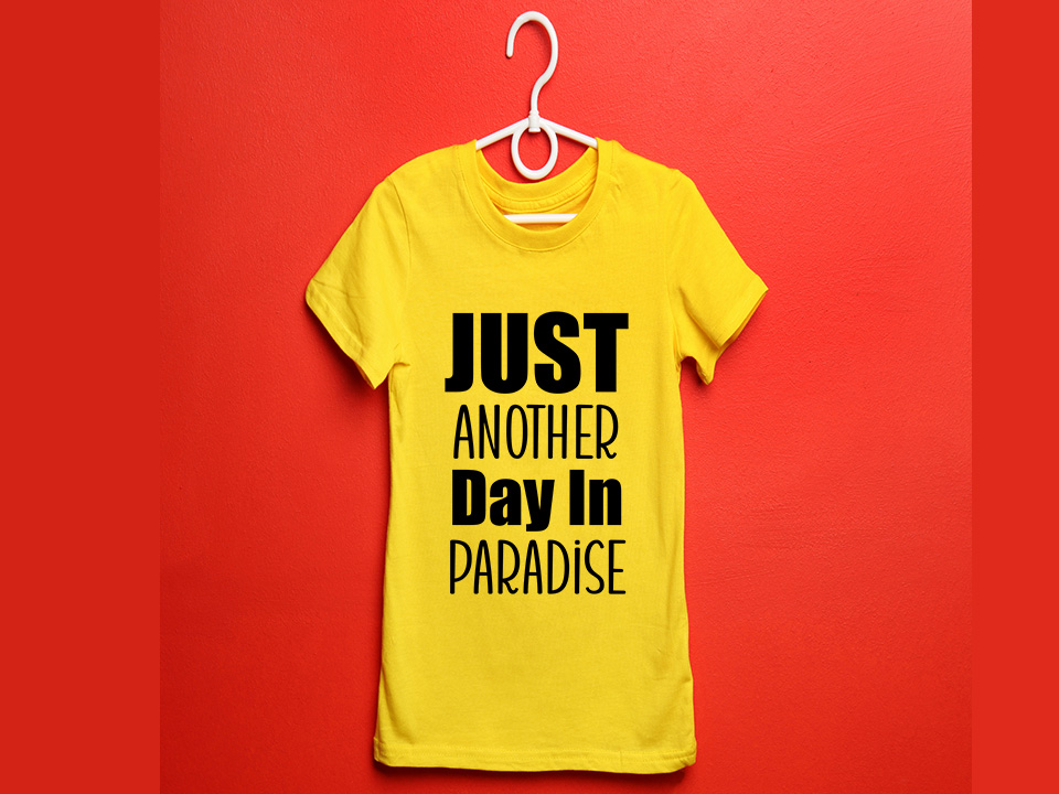 Red background with a yellow t-shirt and black lettering.
