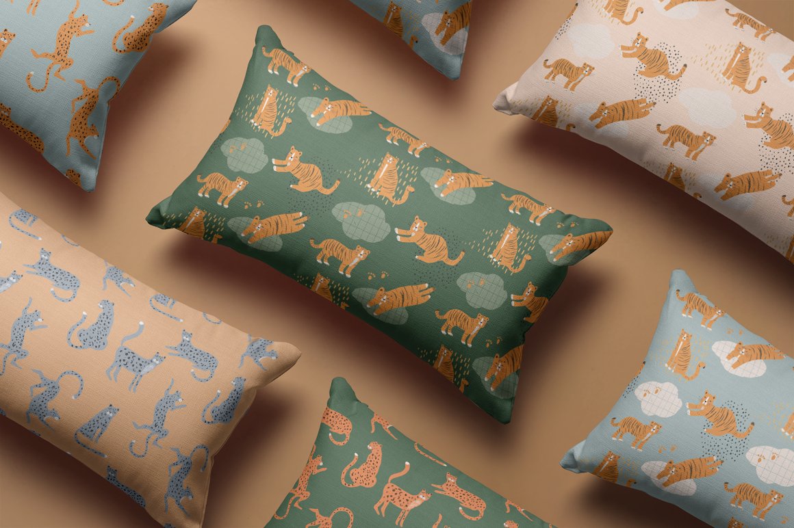 Different colorful pillows with patterns of wild animals on a pink background.