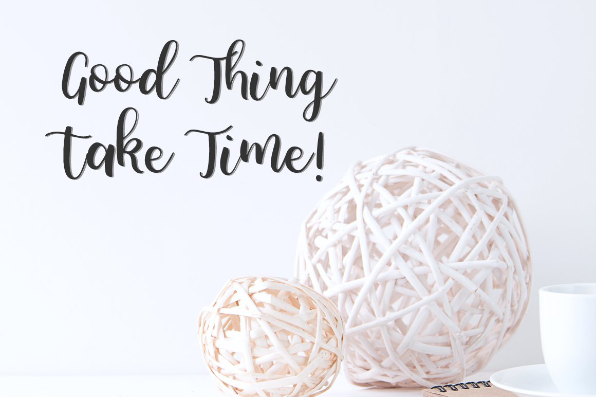 Black lettering "Good thing take time" in Minnie font on the beautiful image.