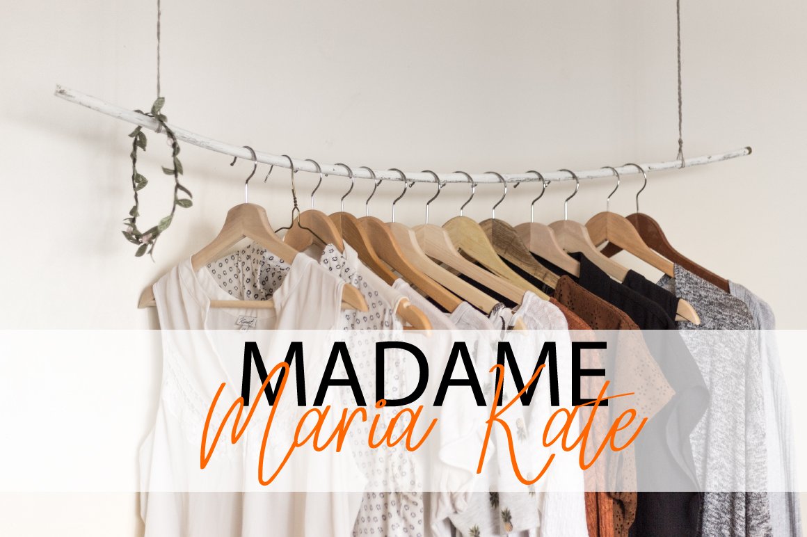 Black and orange lettering "Madame Maria Kate" on the background of imege of clothes.
