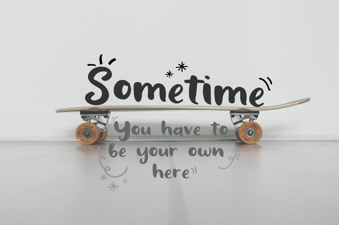 Lettering "Sometime" in script font on the background of skateboard.