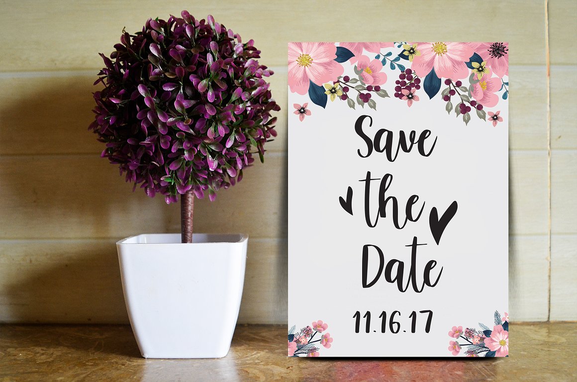 White invitation card with black lettering "Save the date 11.16.17".