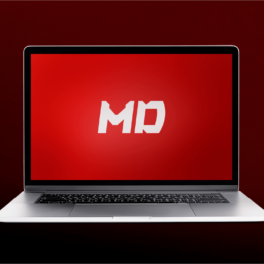 Laptop with red display and white letter logo.