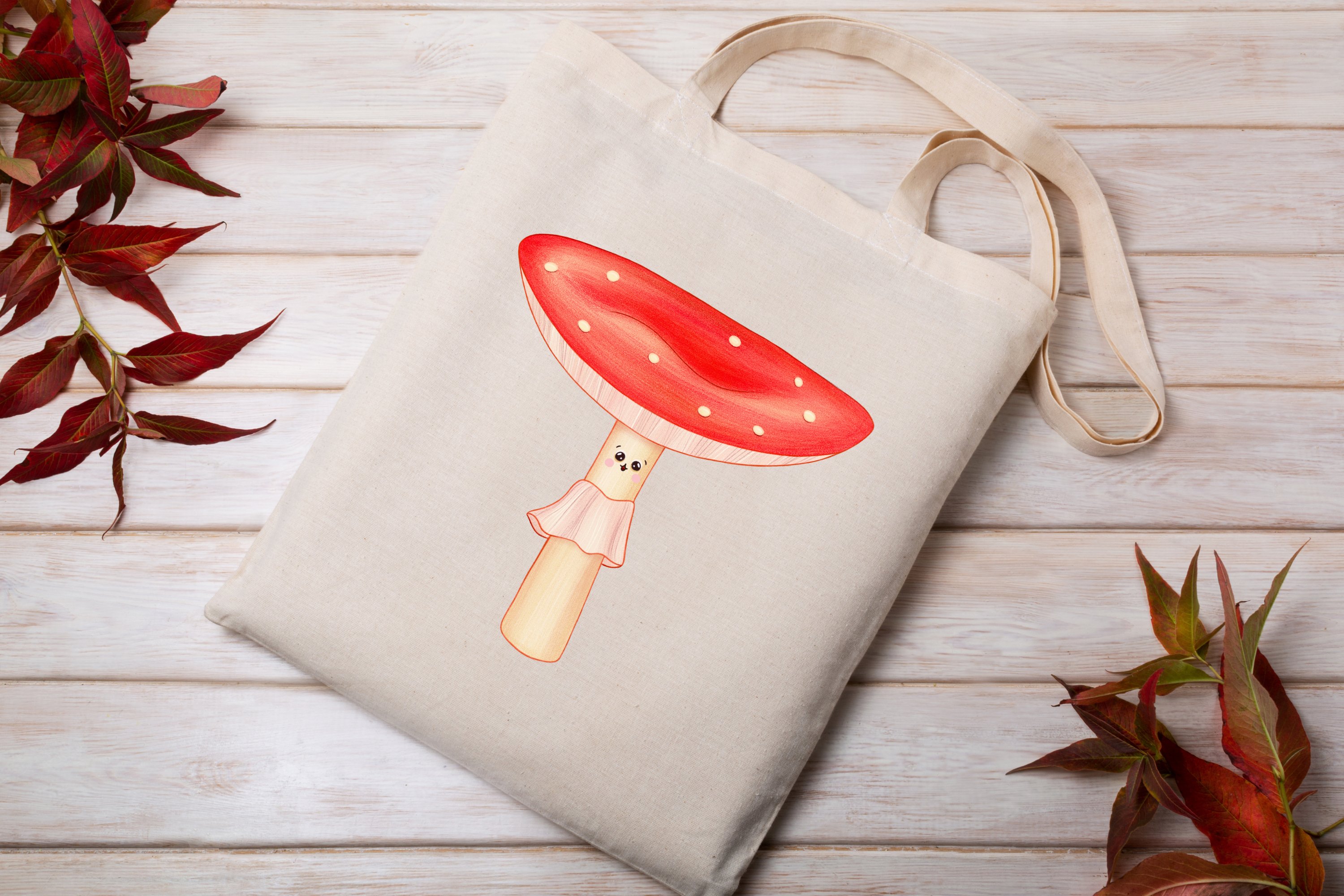 Beige shopping bag with printable mushroom on the wood background.
