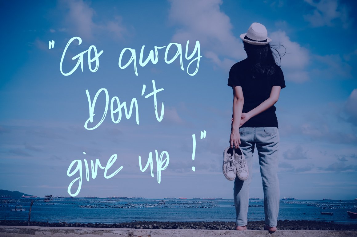 Image of a girl on the beach and quote "Go away don't give up!".