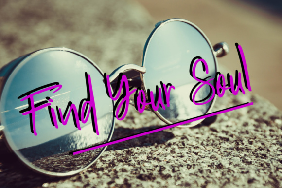 Image of sunglasses with purple lettering "Find Your Soul".