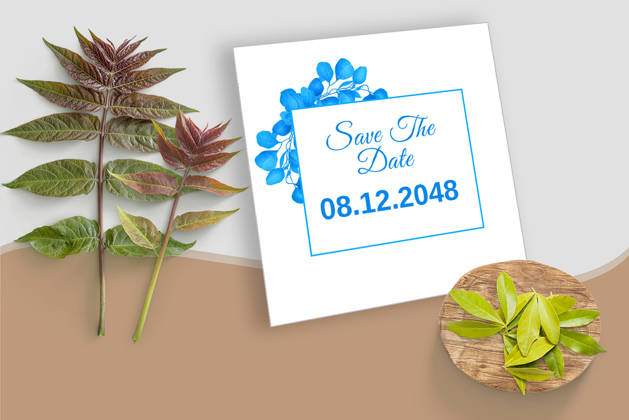 Use Wedding Card Design with Blue Leaf for your events.