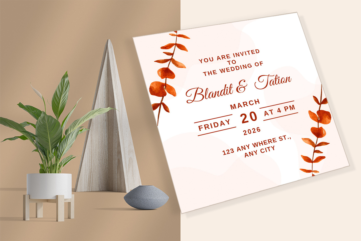 Image of a beautiful wedding invitation with leaves.