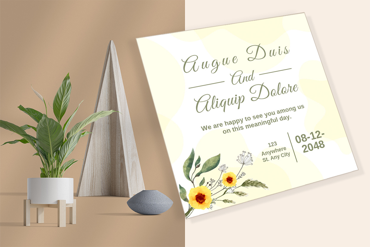 Image of a beautiful wedding invitation with yellow flowers.