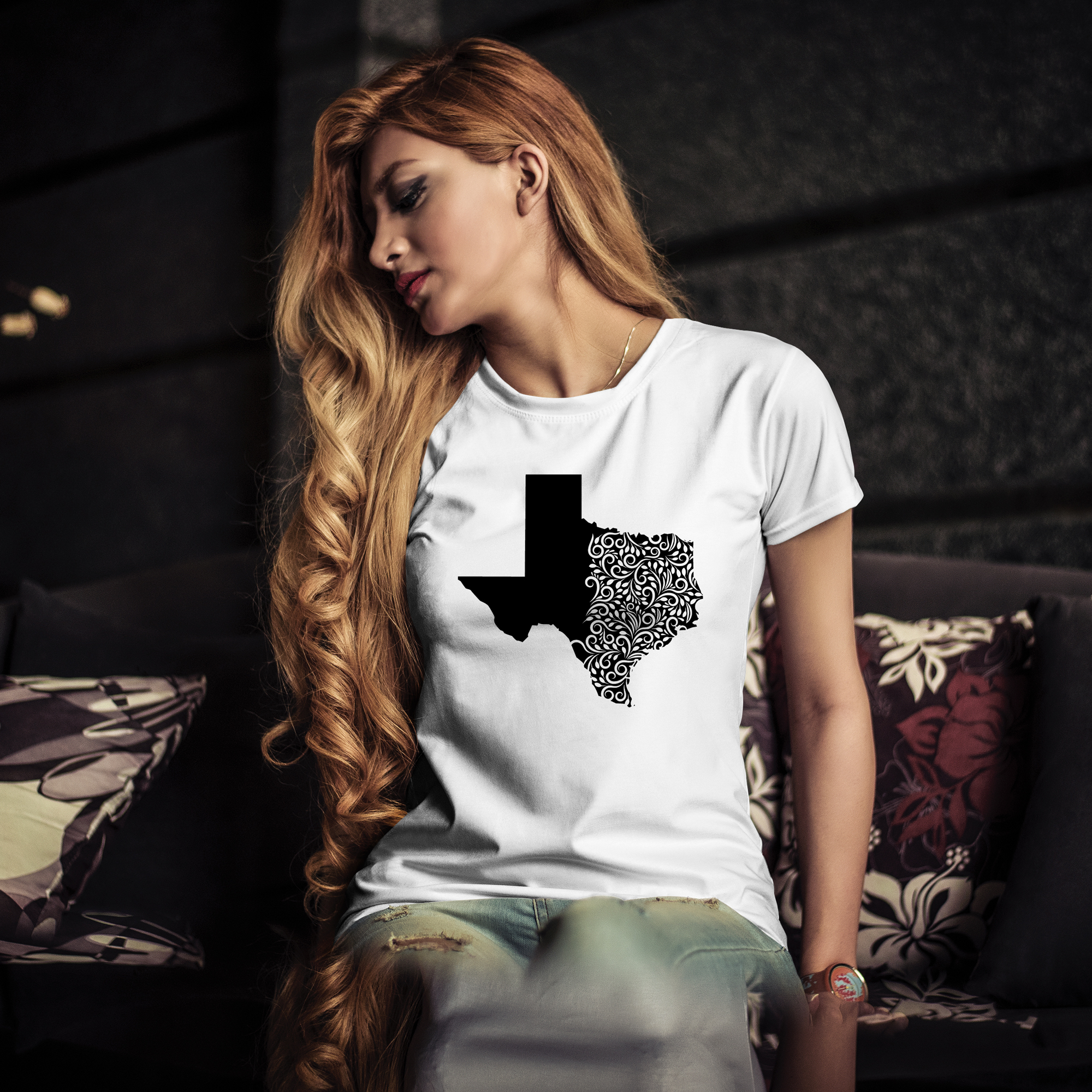 White t-shirt with black illustration of Texas state.
