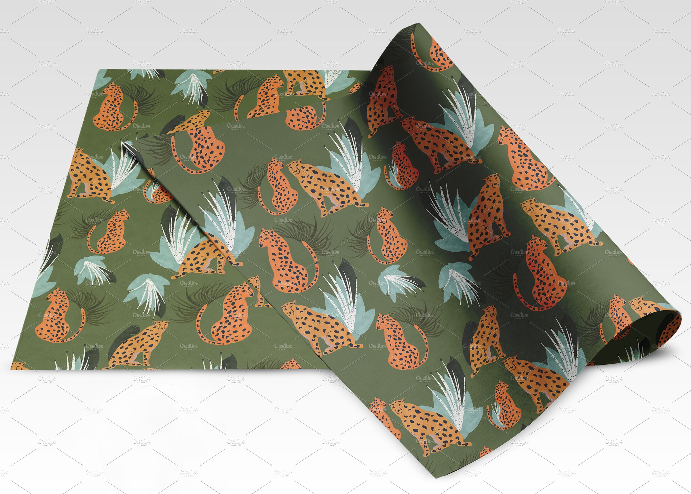 Green fabric with tropical print.