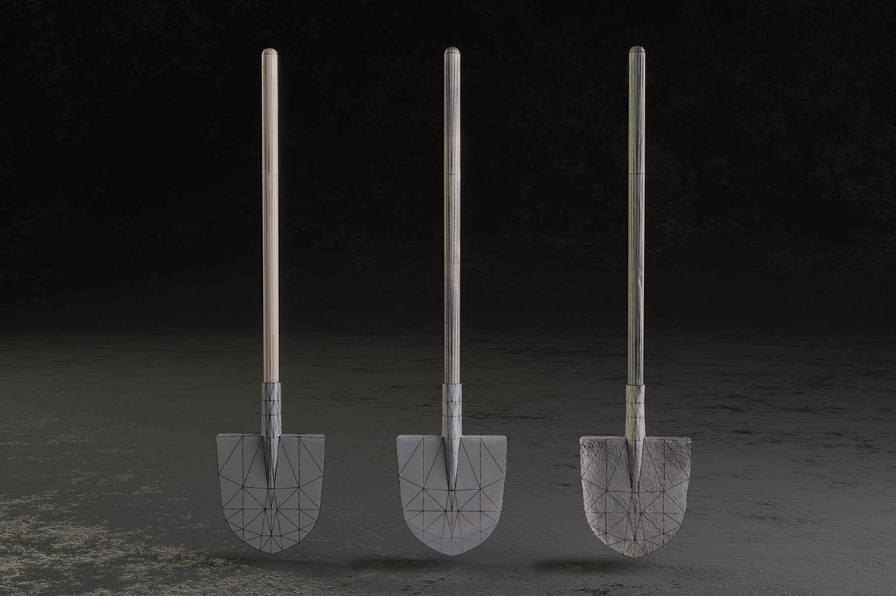 3 gray pointed shovels on a dark gray background.