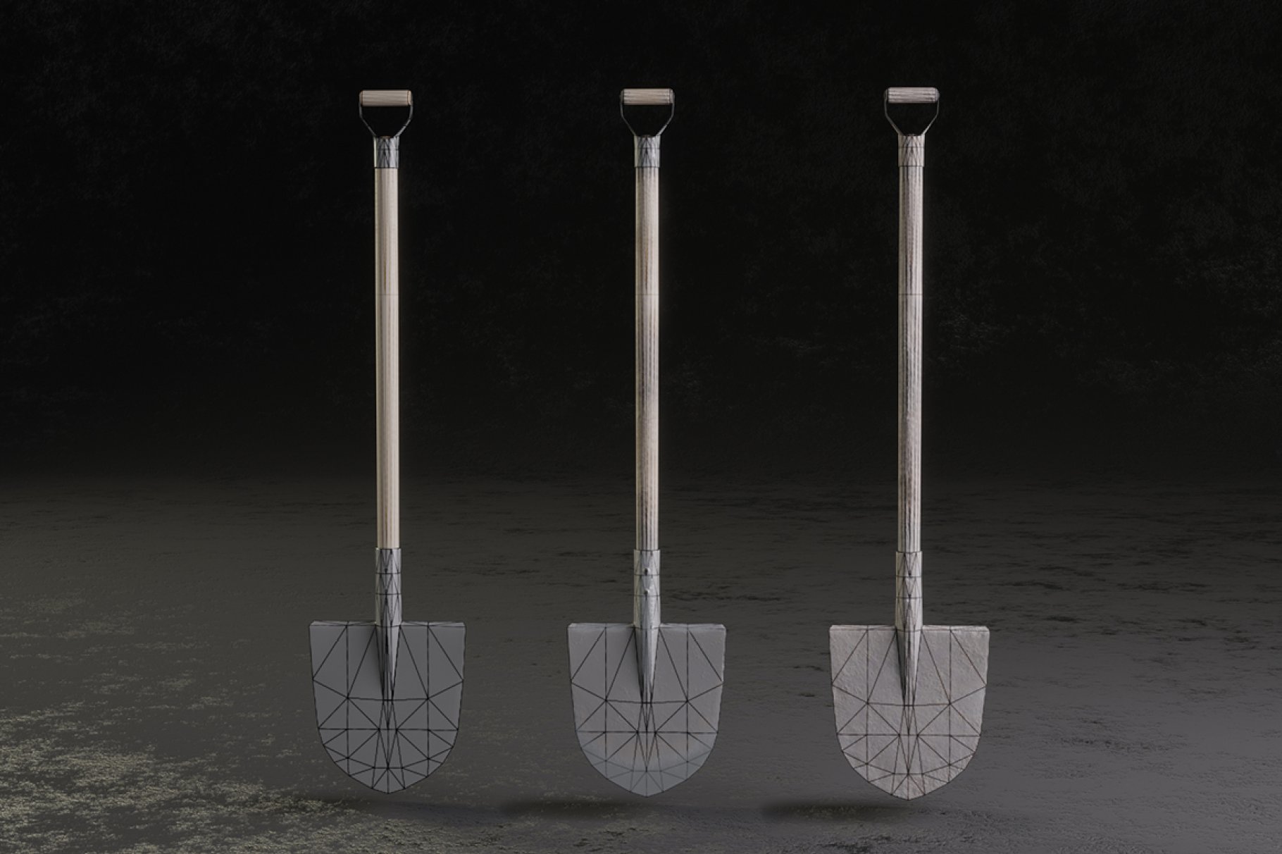 3 gray pointed shovels with handles.