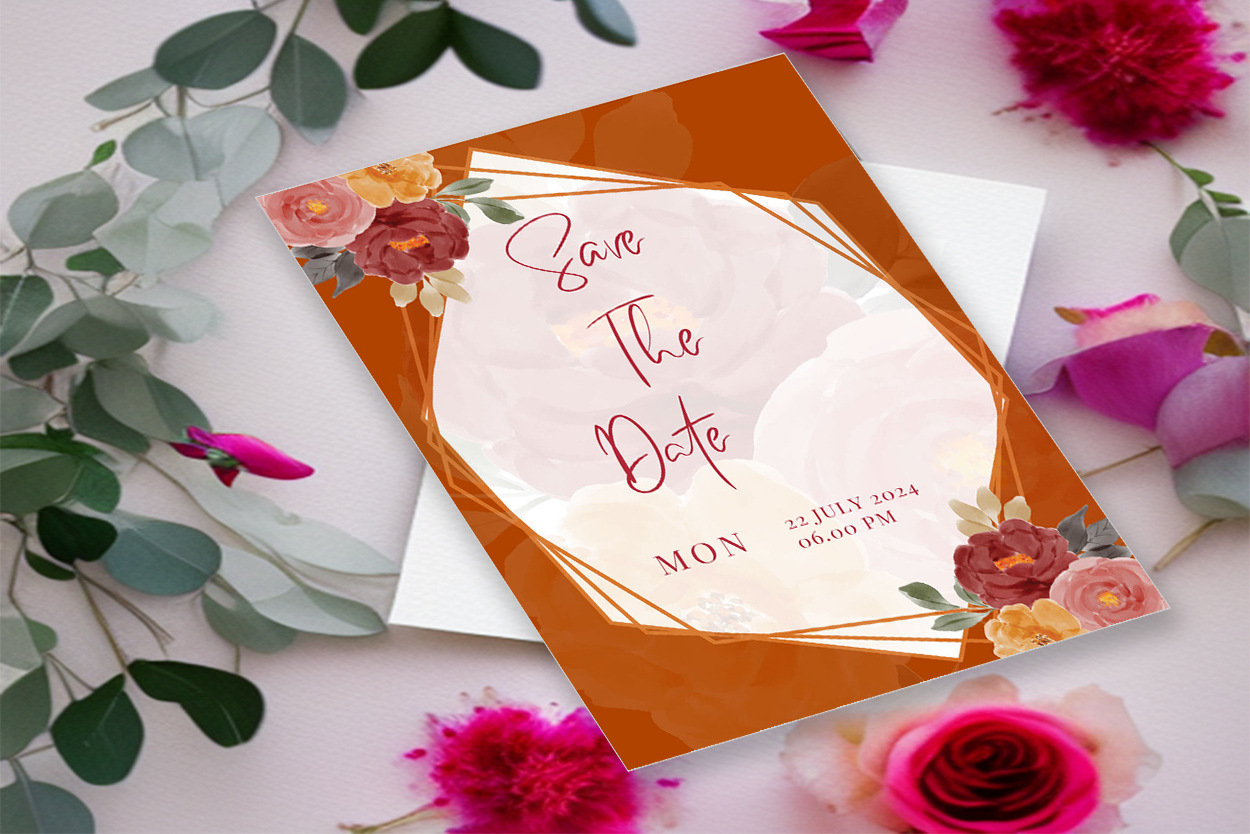 Image of exquisite wedding invitation in orange color.