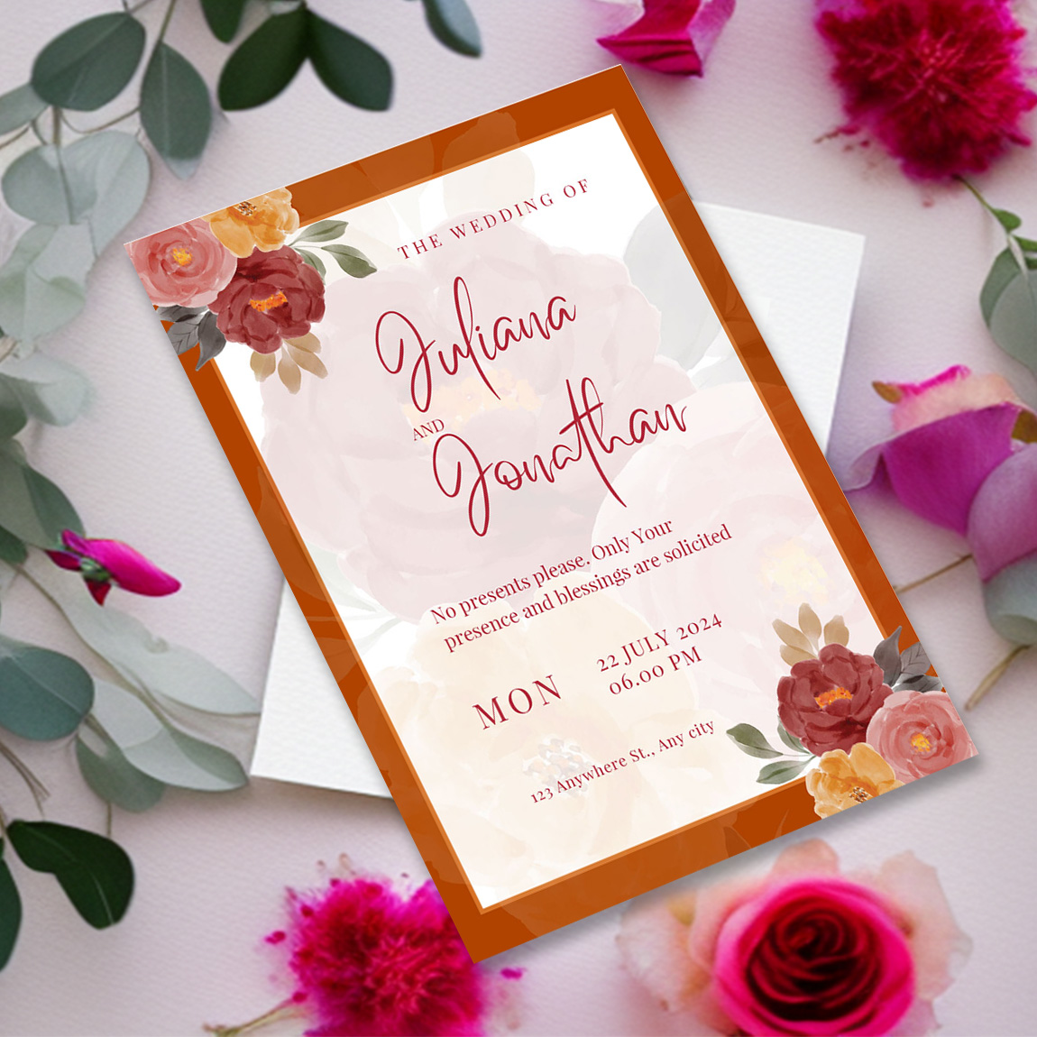 Image of gorgeous wedding invitation in orange color.